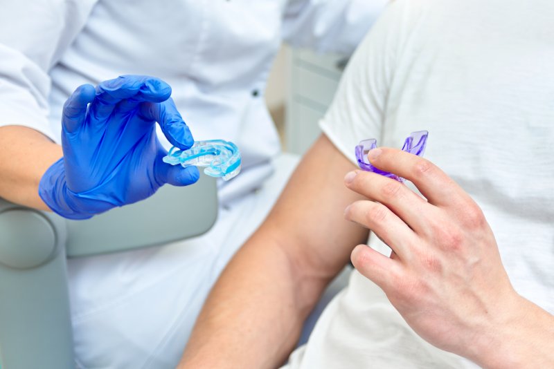 Dentist gives mouthguard