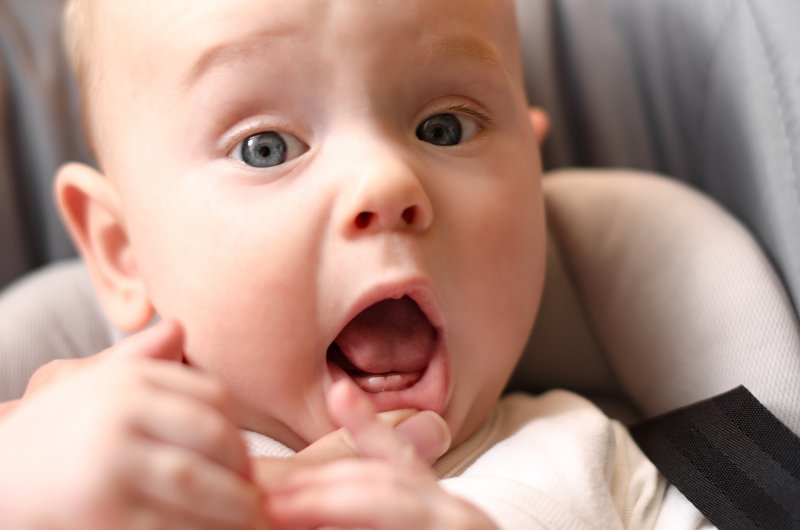 Baby with teeth erupting