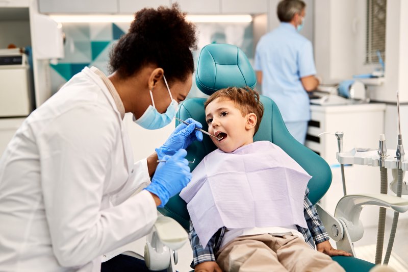 little boy undergoing a dental checkup